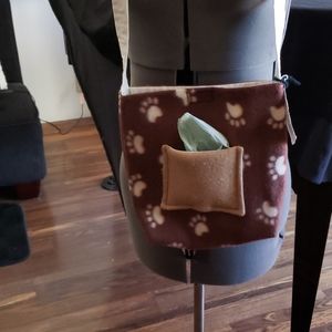 Doggie Bag with Pocket for Poop Bags and dog cap.